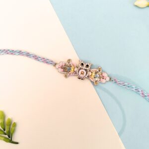 OWL OF NAZAR RAKHI WITH CUSTOMISED INTIAL